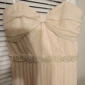 Strapless or spaghetti-strapped gown